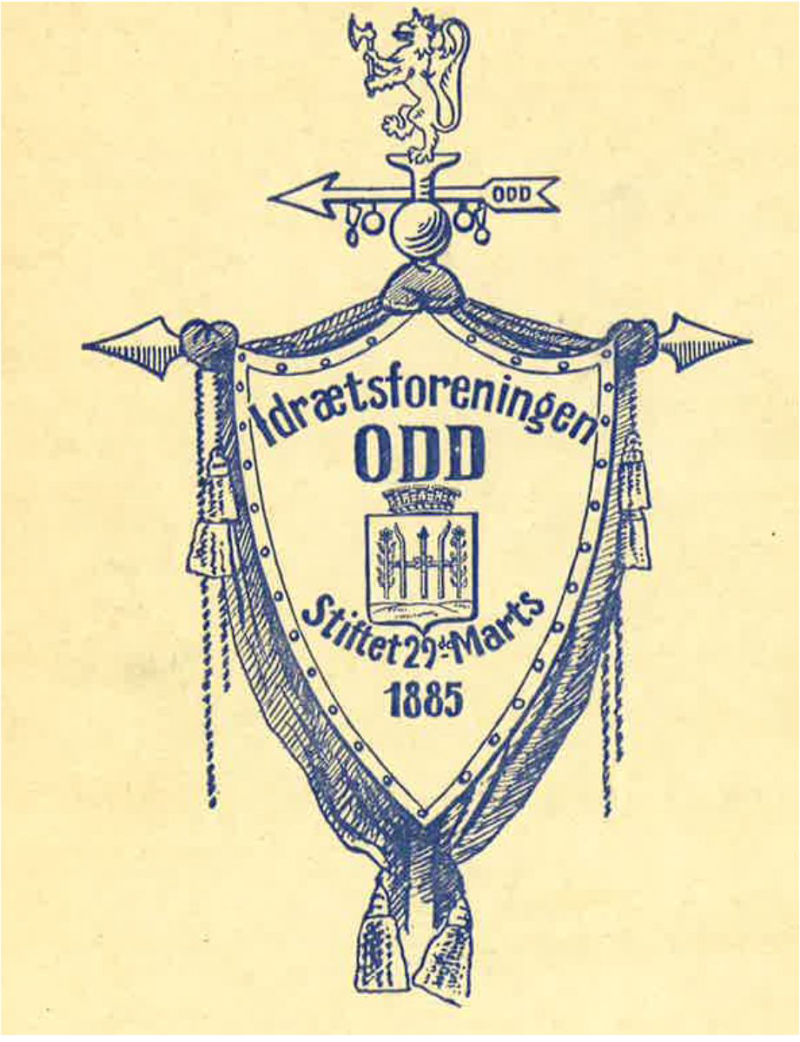 Løve på toppen, så fanepil og midt på står Skiens byvåpen (tegning i medlemsbladet 1929)